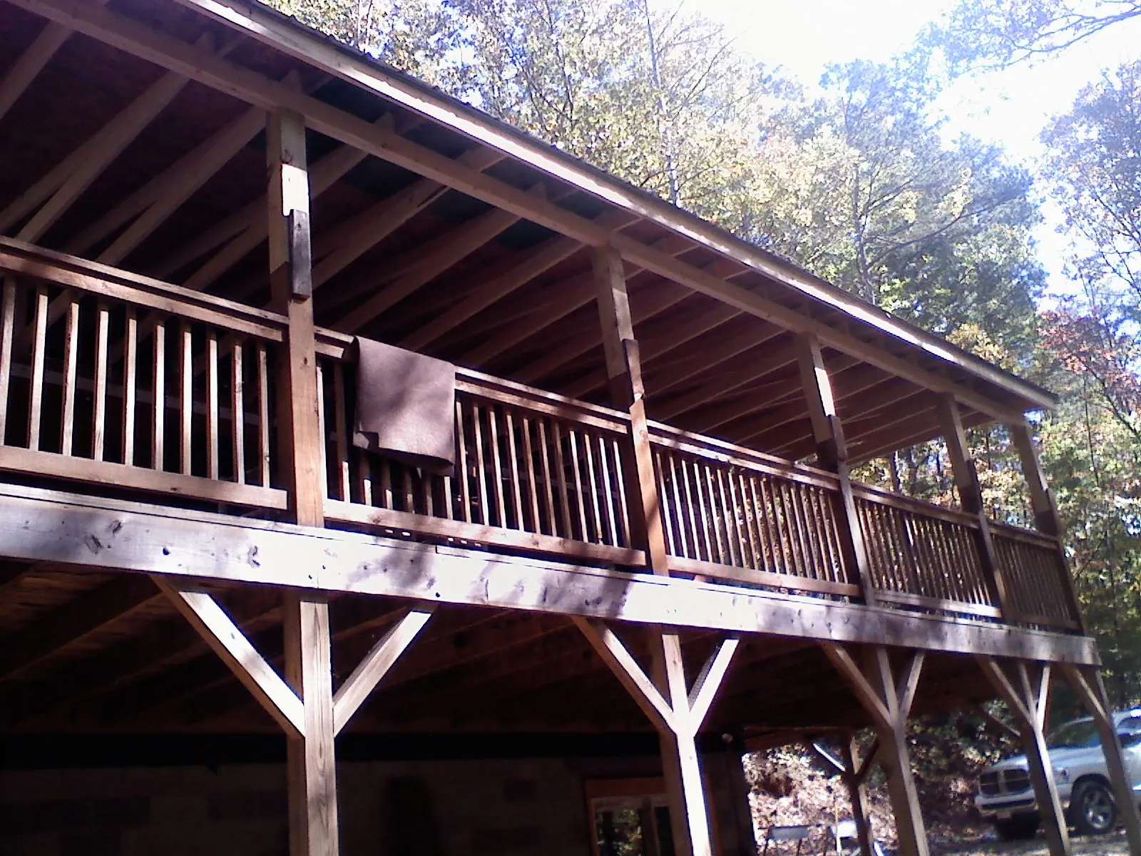 Timber framing under a new elevated porch and deck — Roof Leak Repair in Mc Clellandtown by Roofing Brothers
